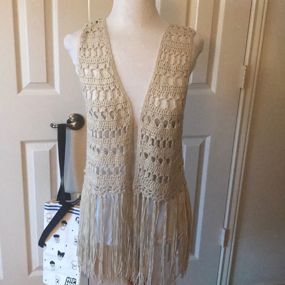 Crochet vest with tassels